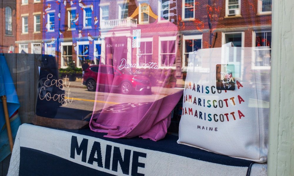 Reflection in store window on Main Street, Damariscotta, Maine