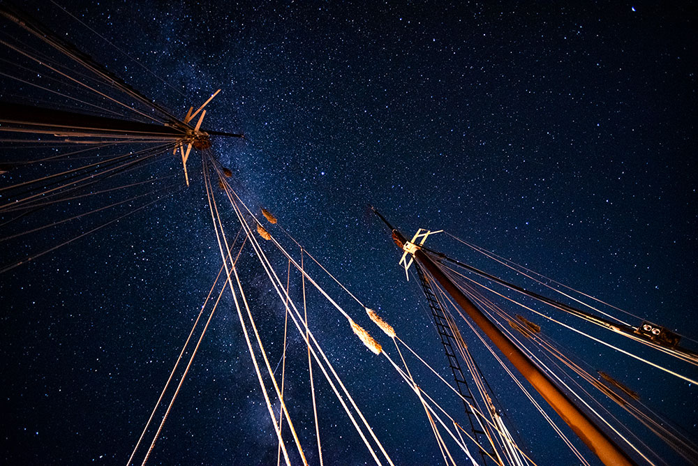 Night sky and the masts of The Angelique windjammer
